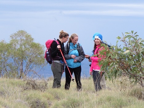 Ladies hiking on a trail